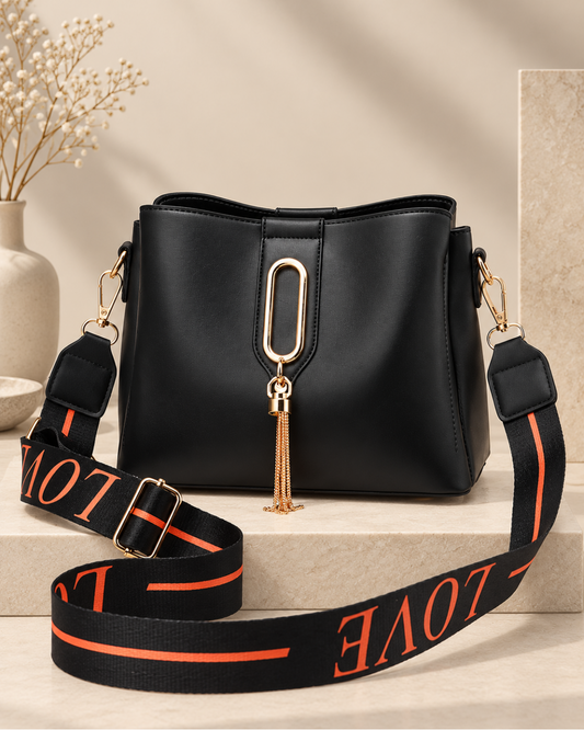 Elegant Structured Shoulder Bag with Gold Tassel & Wide Statement Strap