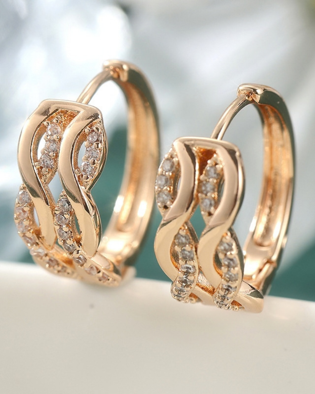 Élan Zircon Twist Huggie Earrings