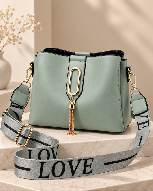 Elegant Structured Shoulder Bag with Gold Tassel & Wide Statement Strap